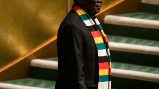 Zimbabwe’s President Signs Law Extending His Term