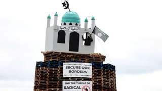 Man arrested after mosque replica put on Northern Ireland bonfire investigated as 'hate crime'