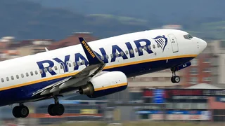 Passenger 'partially sucked out of window' on Ryanair flight