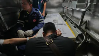 Death toll from a Bangkok music bar fire rises to 30, dozens remain in hospital