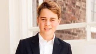 Prince George poses in suit for new photo as he becomes a teenager