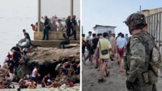 Migrants seen swimming around border fence of Spanish enclave Ceuta
