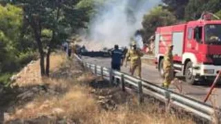 Two crew killed after firefighting helicopters collide in Greece, as British pilot survives