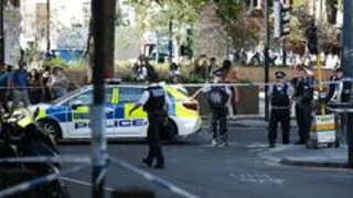 Woman arrested after four stabbed in central London