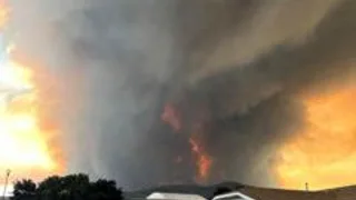 State of emergency declared as fast-moving Canada wildfire doubles in size