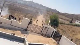 Israeli settlers besieging Palestinian families in West Bank village