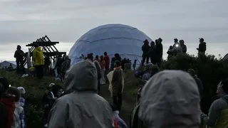 Muddling through Iceland’s rainy eclipse, accompanied by clouds, whales and at least one proposal.