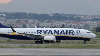 Engine Blade Hit Window on Jet Before Man Was Partly Sucked Outside, Report Says