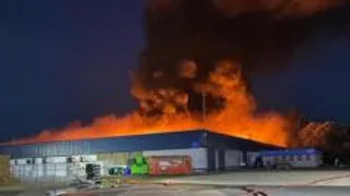 Crews tackle warehouse blaze in early hours