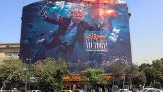 Iran Pledges to Defy Trump’s Economic Sanctions