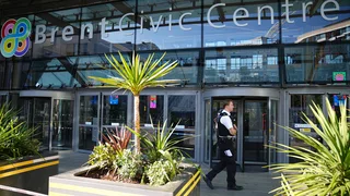 Boy arrested after teenager stabbed to death at council headquarters