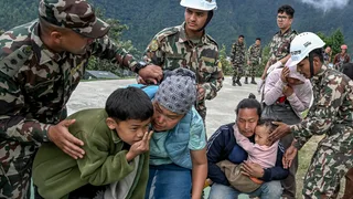Live Updates: Rescuers Search for Missing and Stranded Under Threat of More Floods