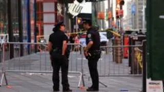 Woman killed in Times Square stabbing, suspect shot dead by police