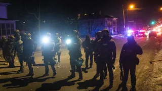 ICE Agent Charged With Lying About Minnesota Shooting