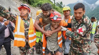 2 trapped workers rescued from a hydropower tunnel 9 days after Nepal floods