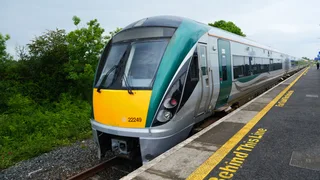 Boy dies after car hit by train