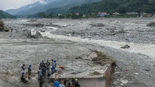 Nepal Floods Buried a House. The Woman Inside Was Still Alive.