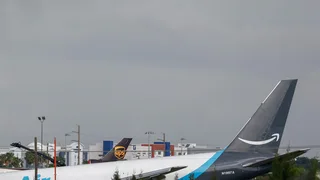 Cargo Plane Crashes at Miami Airport, Striking Vehicles