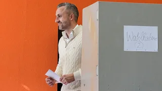 German exit polls suggest far-right party has big lead in regional election