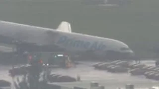 Video shows damaged Amazon cargo plane after crash