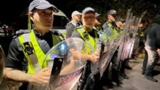 Minister condemns disorder at Portsmouth anti-migrant protest after police officers hurt