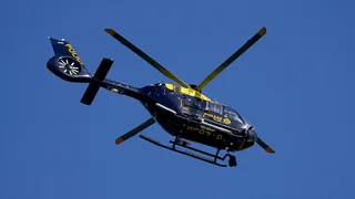 Hunt for women and man after driver killed in hit-and-run crash near airport