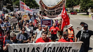 Dozens of Protesters Gather Outside the Republican Midterm Convention in Dallas