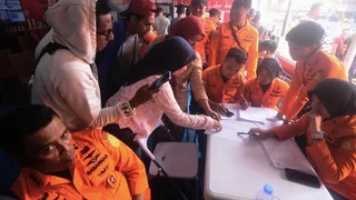 Indonesian passenger ship overturns, sparking search for about 130 missing