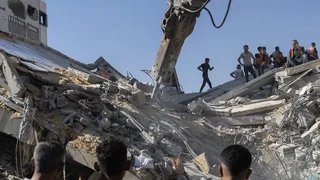 At Least 16 Dead in Gaza After Building Collapse, Officials Say