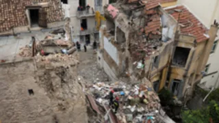 At least two dead after explosion destroys building close to Acropolis in Athens