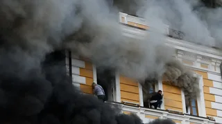 Russian Drone Strikes Ukraine’s Science Academy, Causing Fire in City Center