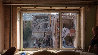 Russian strikes on Ukraine's public buses leave 30 dead as blackouts worsen in Kyiv
