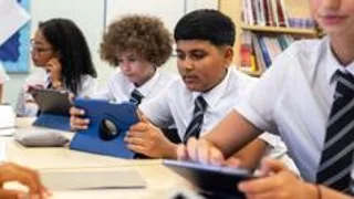 Cut screen time in classrooms to avoid long-term health issues, clinicians urge