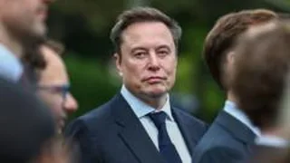 Why does Elon Musk want to merge Tesla and SpaceX?