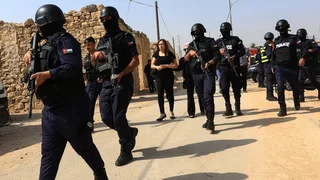 Three men arrested in shootout after deadly attack on church in Jordan