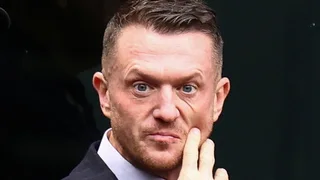 Tommy Robinson found guilty of harassing two journalists